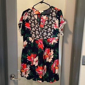 UMGEE size medium. Flow dress with pockets excellent use condition.